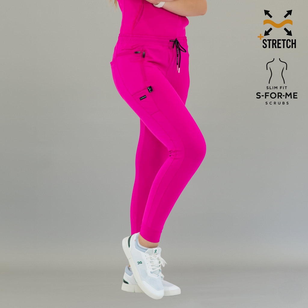 Side view of fuchsia Women's Joggers Pants 920 with legs crossed.