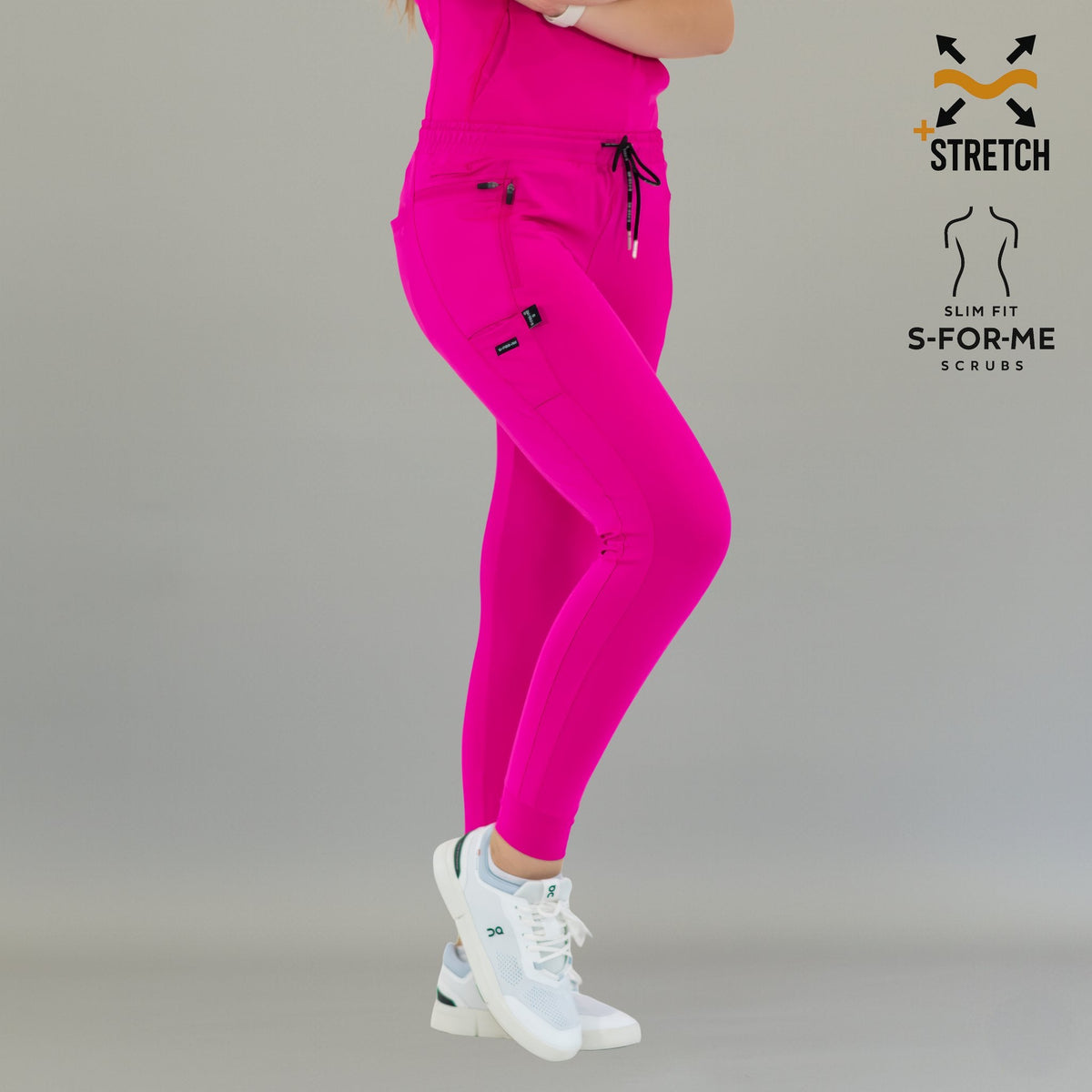 Side view of fuchsia Women's Joggers Pants 920 with legs crossed.