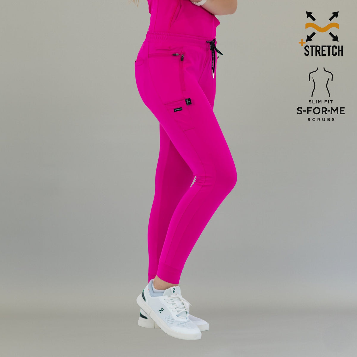 Side view of fuchsia Women's Joggers Pants 920 with one leg bent back.