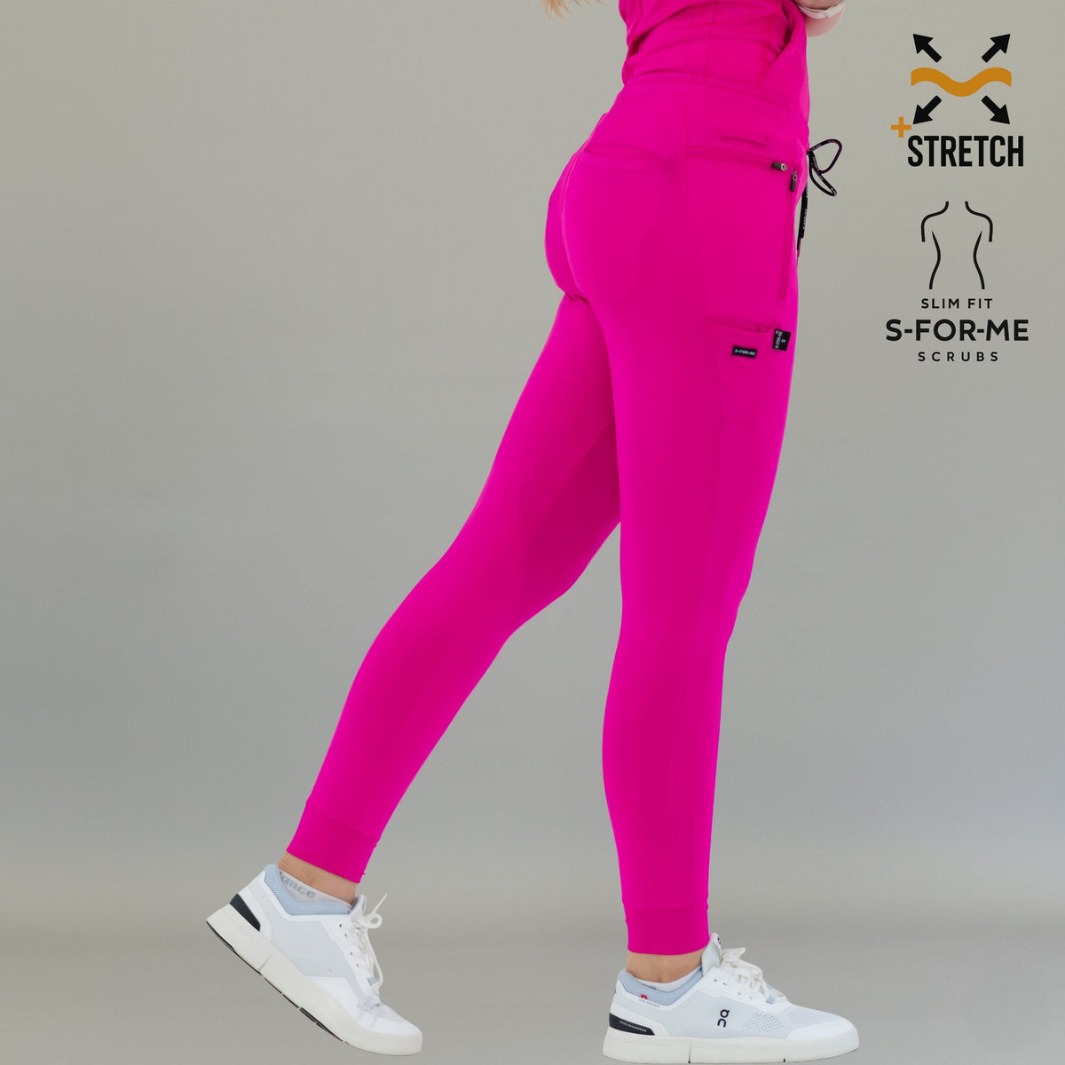 Rear side angle of fuchsia Women's Jogger Pants 920 stepping forward.