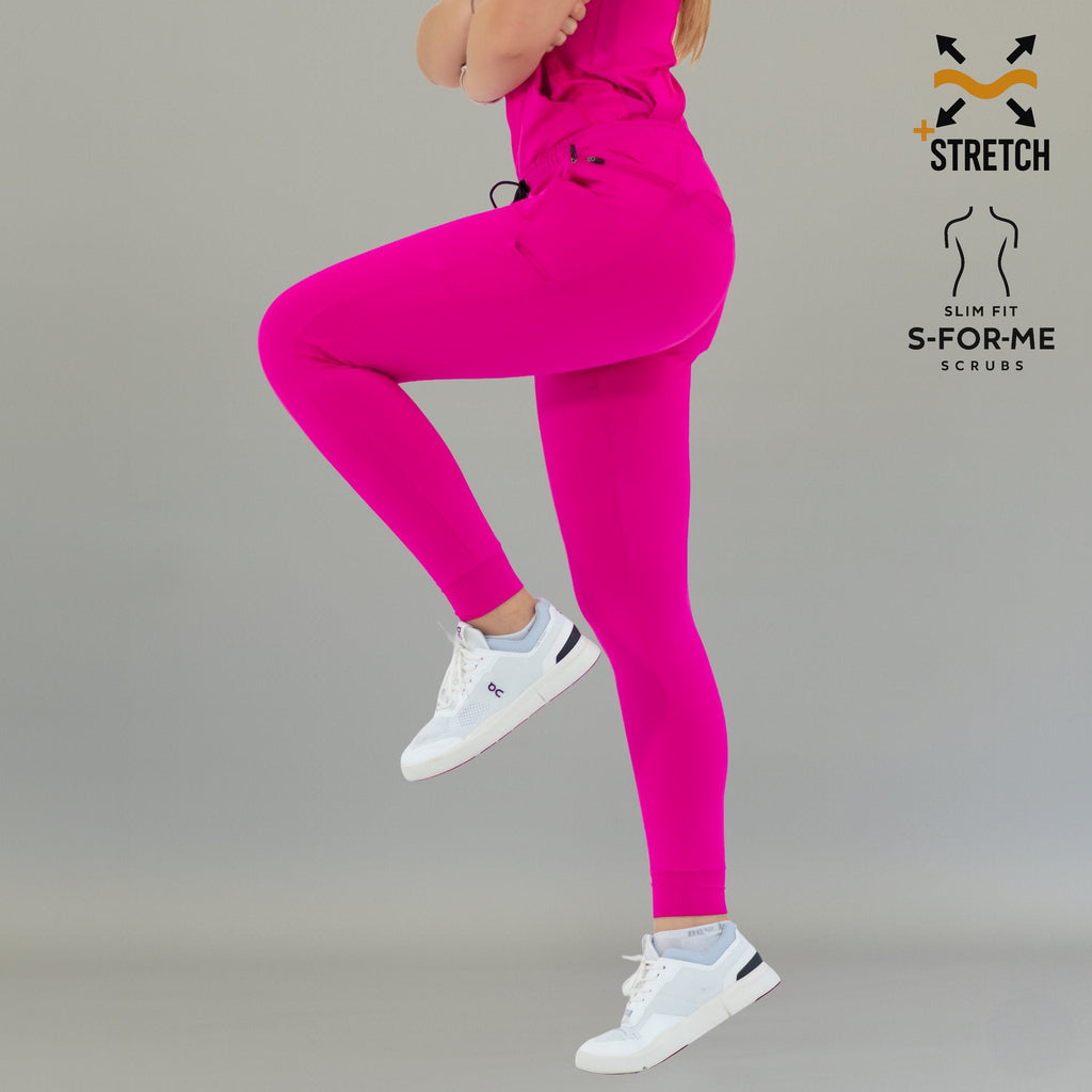 Side view of fuchsia Women's Joggers Pants 920 with one leg raised high.