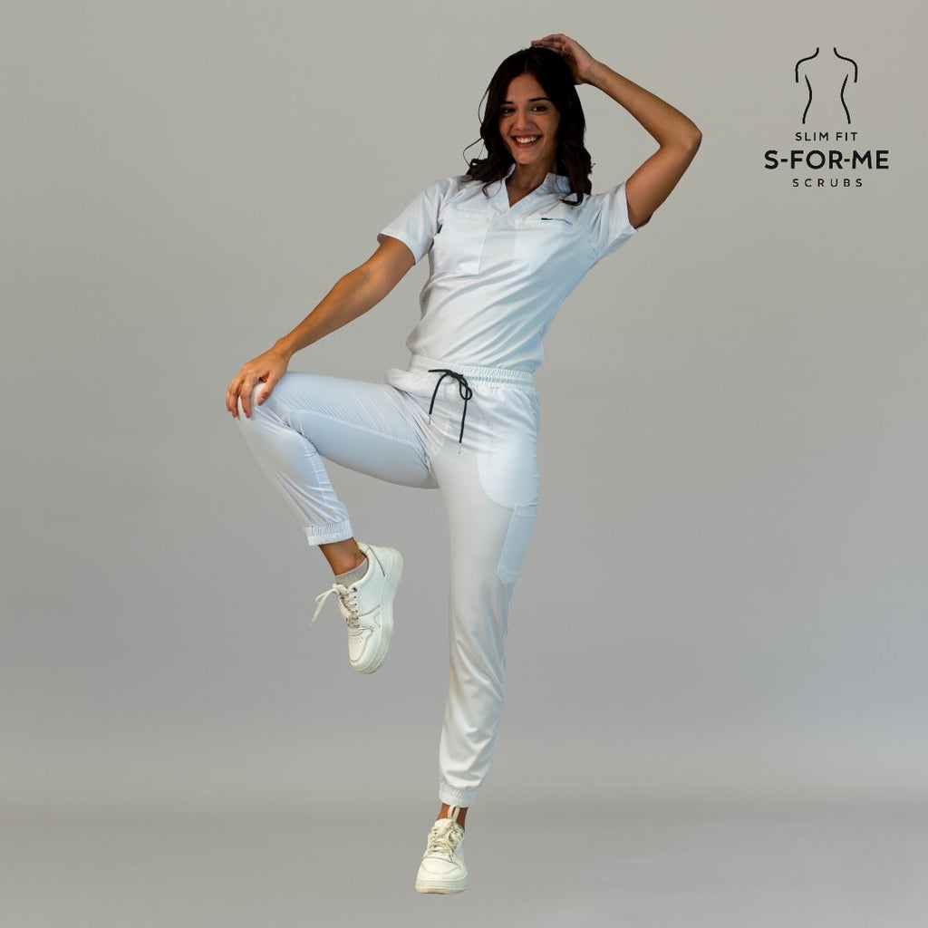 Women’s white scrub uniform set in active lifestyle pose
