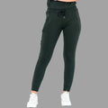 Front view of women's scrub joggers 920 super stretch bottle green with drawstring waist.