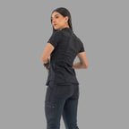 Women's black Style 930 scrub top, back three-quarter view