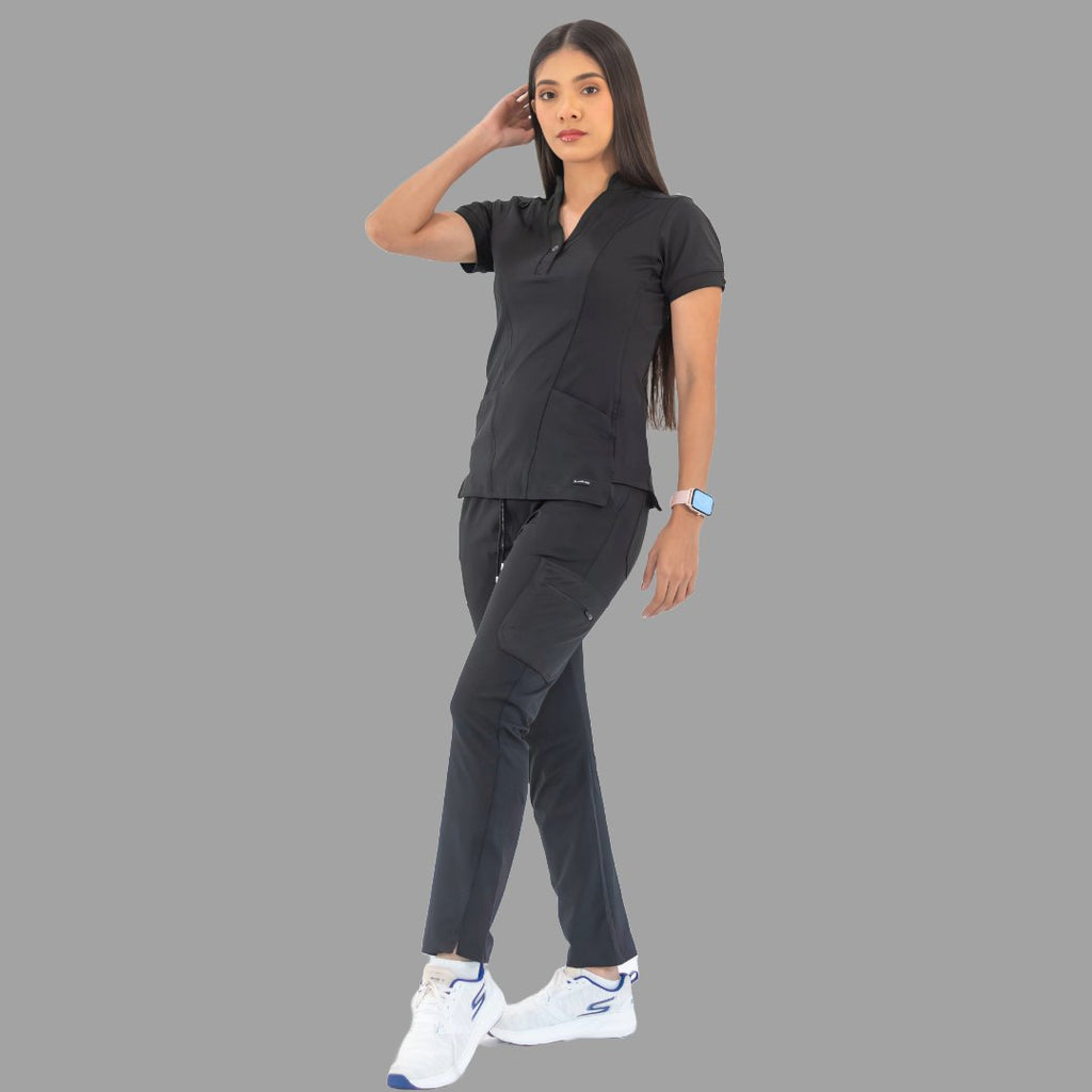 Women's black Style 930 scrub top, full body front three-quarter view